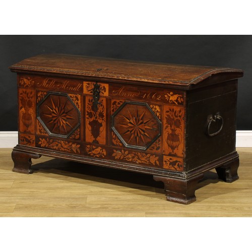 1525 - A 17th century German oak and marquetry chest, hinged domed cover enclosing a till and secret compar... 