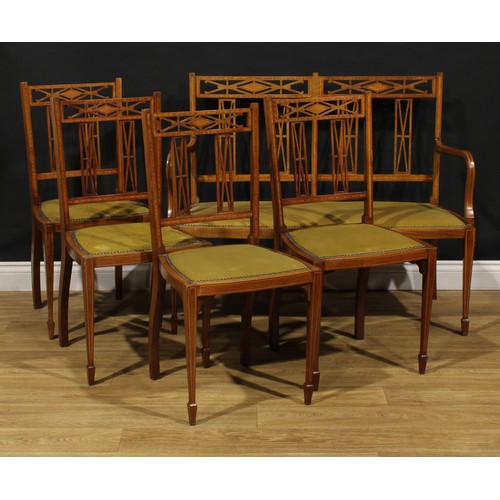 1557 - An Edwardian satinwood banded mahogany five-piece salon suite, comprising sofa and four side chairs,... 