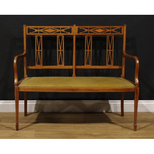 1557 - An Edwardian satinwood banded mahogany five-piece salon suite, comprising sofa and four side chairs,... 