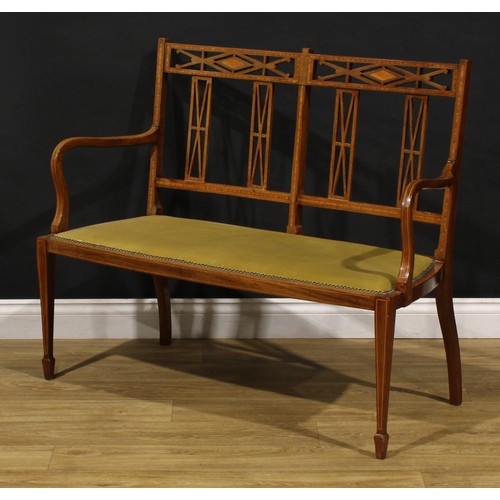 1557 - An Edwardian satinwood banded mahogany five-piece salon suite, comprising sofa and four side chairs,... 