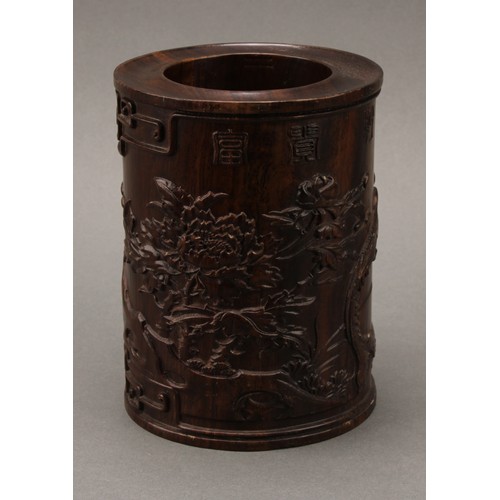 1398 - A Chinese hardwood scholar's bitong brush pot,  carved in relief with phoenix, flowers, trellis, pru... 