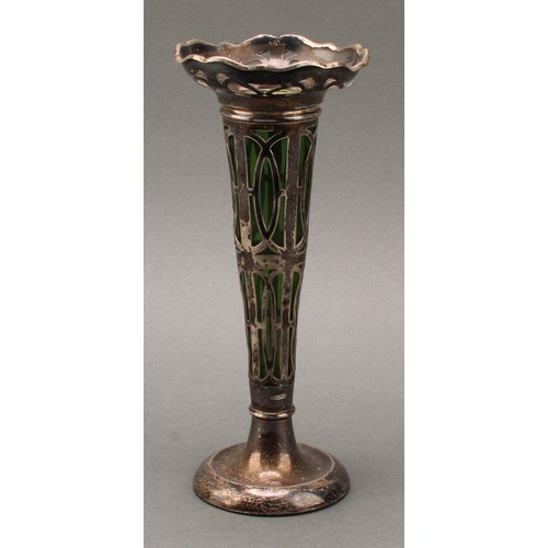 453 - An Art Nouveau silver trumpet shaped specimen vase, shaped everted rim, pierced side, green glass li... 