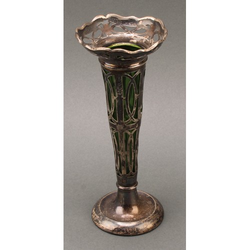 453 - An Art Nouveau silver trumpet shaped specimen vase, shaped everted rim, pierced side, green glass li... 