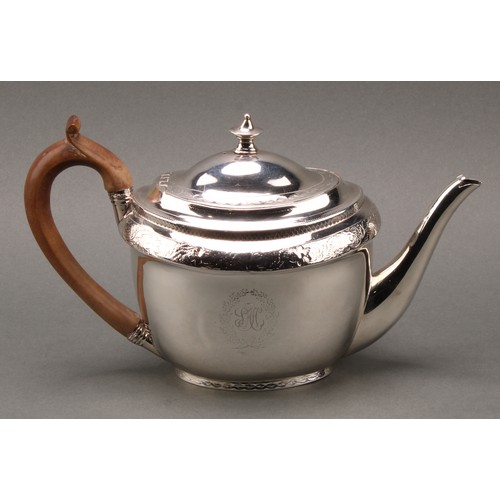 126 - A George III silver oval teapot, bright-cut engraved, flush-hinged domed cover with urn finial, scro... 