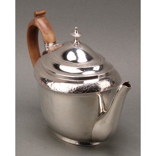 126 - A George III silver oval teapot, bright-cut engraved, flush-hinged domed cover with urn finial, scro... 