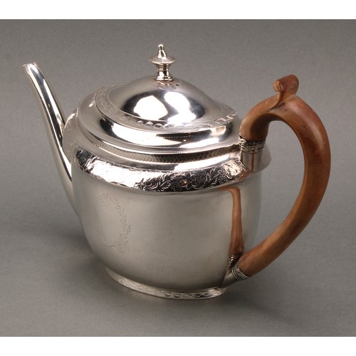 126 - A George III silver oval teapot, bright-cut engraved, flush-hinged domed cover with urn finial, scro... 