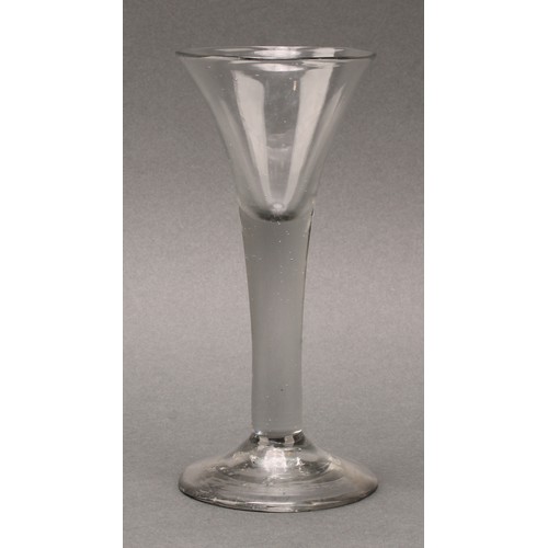 1362 - A George II trumpet shaped wine glass, hollow stem, domed foot, 16.5cm high, c.1750