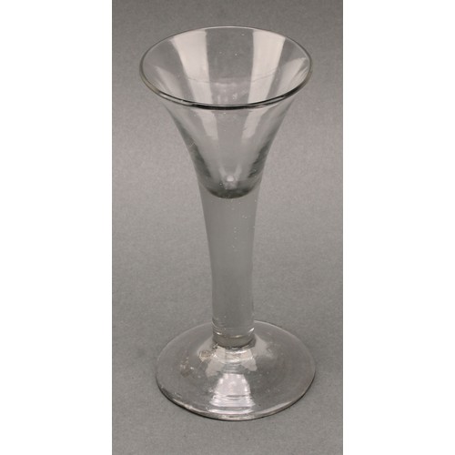 1362 - A George II trumpet shaped wine glass, hollow stem, domed foot, 16.5cm high, c.1750