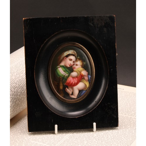 2024 - A Continental porcelain plaque, painted after Raphael with the Madonna della Seggiola, oval, 7.5cm x... 