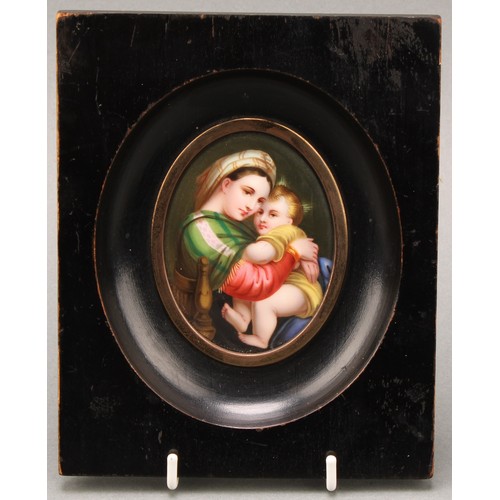 2024 - A Continental porcelain plaque, painted after Raphael with the Madonna della Seggiola, oval, 7.5cm x... 