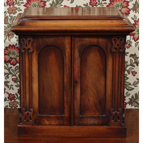 1875 - A William IV/early Victorian mahogany collector's table cabinet, sarcophagus cresting above a pair o... 