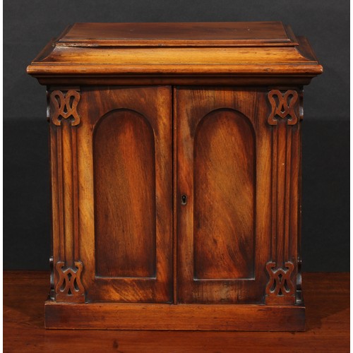 1875 - A William IV/early Victorian mahogany collector's table cabinet, sarcophagus cresting above a pair o... 