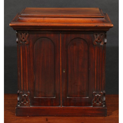 1875 - A William IV/early Victorian mahogany collector's table cabinet, sarcophagus cresting above a pair o... 