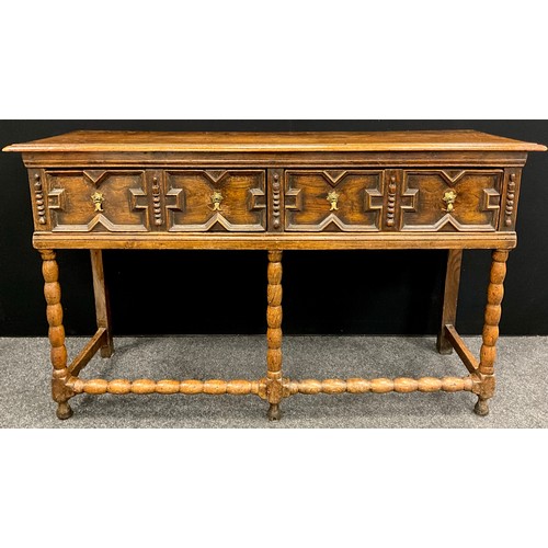 1571 - An early 19th century Jacobean Revival oak dresser base, 91cm high, 153cm wide, 47cm deep