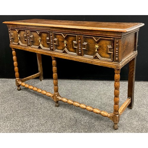 1571 - An early 19th century Jacobean Revival oak dresser base, 91cm high, 153cm wide, 47cm deep