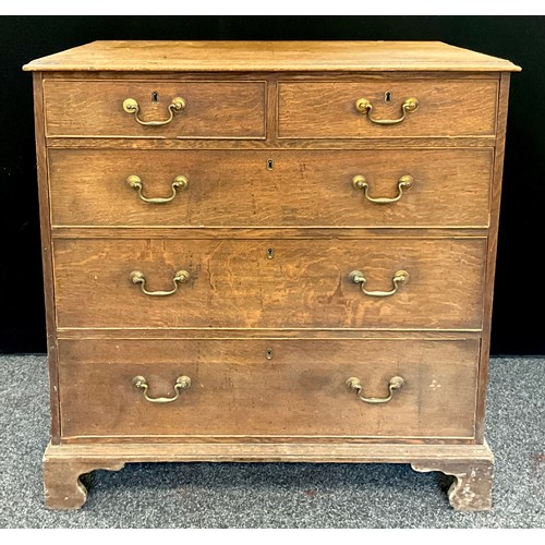 1778 - A George III oak chest of two short over three graduated long drawers, bracket feet, 97cm high, 94.5... 