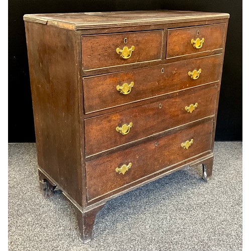 1779 - A George III oak chest of two short, over three graduated long drawers, bracket feet, 98cm high, 90.... 