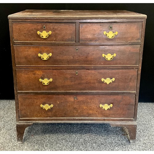 1779 - A George III oak chest of two short, over three graduated long drawers, bracket feet, 98cm high, 90.... 