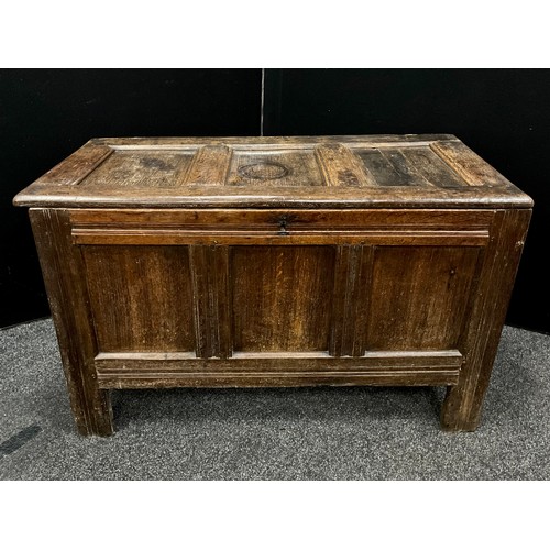 1527 - A 17th century oak three panel coffer, or blanket chest, stile feet, 69cm high, 110.5cm wide, 50.5cm... 