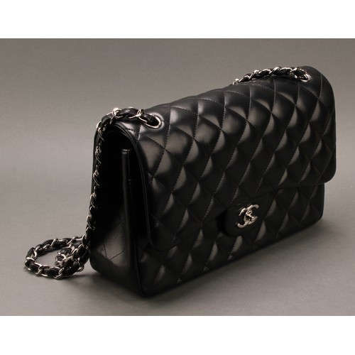 2014 - A Chanel quilted black leather Jumbo Classic handbag, interlacing double C monogram in silver, faste... 