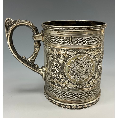 470 - An Edwardian silver embossed christening cup or mug, Walker & Hall, Sheffield 1902, impressed marks,... 