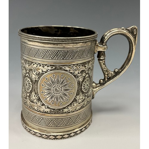 470 - An Edwardian silver embossed christening cup or mug, Walker & Hall, Sheffield 1902, impressed marks,... 