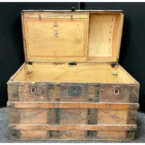 1586 - A 19th century dome top travelling trunk, with original fitted interior, 67cm high x 92cm x 50.5cm.