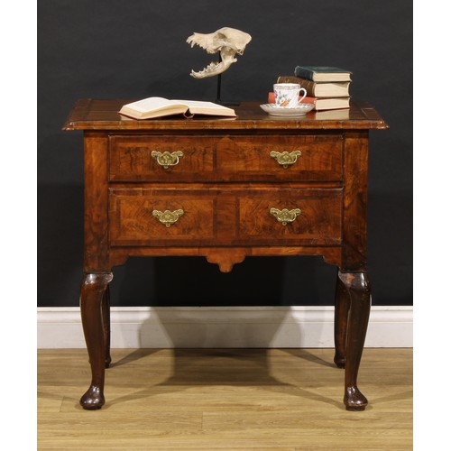 1537 - A George I walnut lowboy, moulded crossbanded quarter-veneered top above two long drawers, shaped ap... 