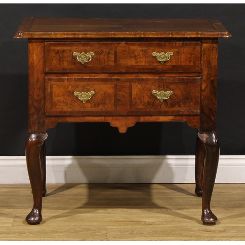 1537 - A George I walnut lowboy, moulded crossbanded quarter-veneered top above two long drawers, shaped ap... 