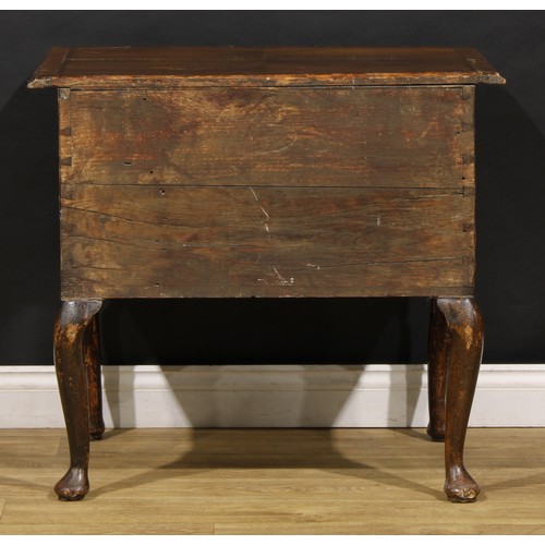 1537 - A George I walnut lowboy, moulded crossbanded quarter-veneered top above two long drawers, shaped ap... 