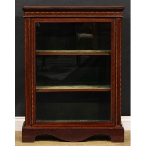 1554 - An Edwardian mahogany pier display cabinet, rectangular top with moulded edge above a glazed door, o... 