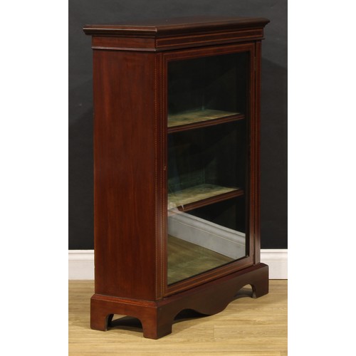 1554 - An Edwardian mahogany pier display cabinet, rectangular top with moulded edge above a glazed door, o... 