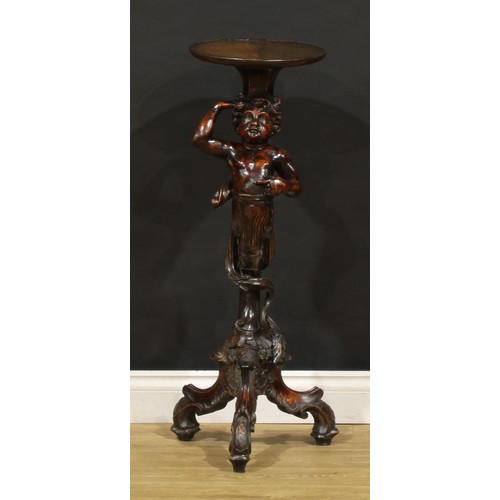 1676 - A 19th century Venetian blackamoor torchere, dished circular plateau, the support carved as scantily... 