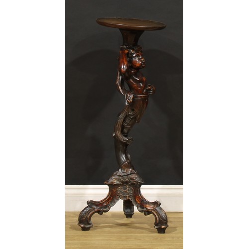 1676 - A 19th century Venetian blackamoor torchere, dished circular plateau, the support carved as scantily... 