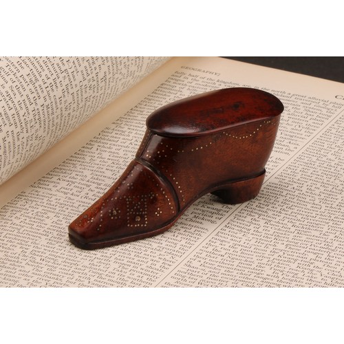 2079 - A 19th century mahogany novelty snuff box, as a shoe, decorated with brass pinwork, 10cm long