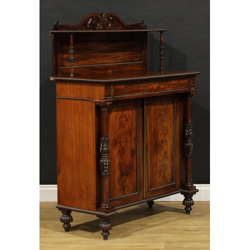 1902 - A George IV mahogany chiffonier, possibly Scottish, shaped cresting carved with acanthus scrolls, ab... 