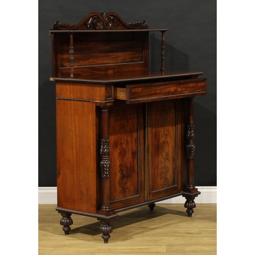 1902 - A George IV mahogany chiffonier, possibly Scottish, shaped cresting carved with acanthus scrolls, ab... 