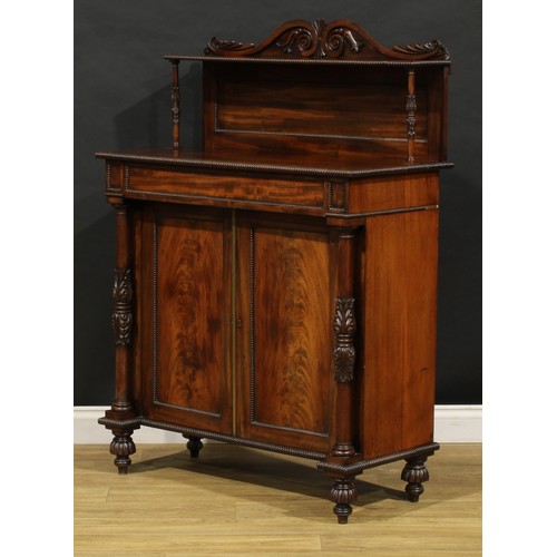 1902 - A George IV mahogany chiffonier, possibly Scottish, shaped cresting carved with acanthus scrolls, ab... 