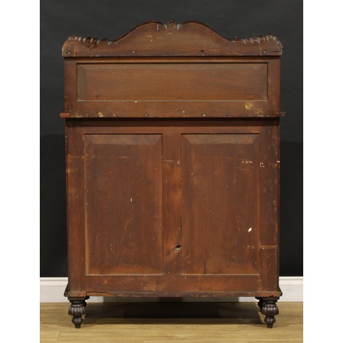 1902 - A George IV mahogany chiffonier, possibly Scottish, shaped cresting carved with acanthus scrolls, ab... 