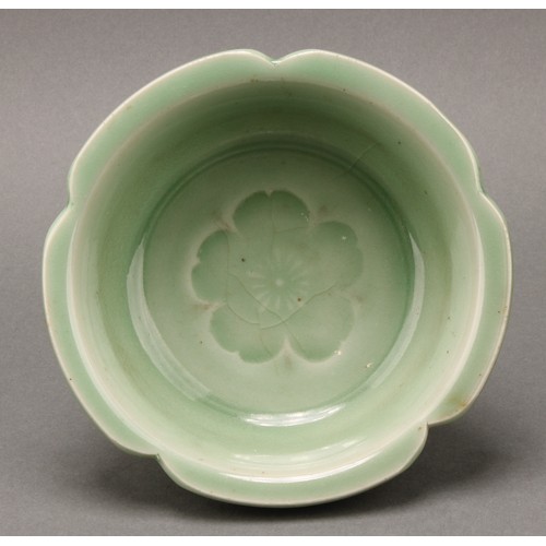 1388 - A Chinese celadon lotus shaped bowl, 16cm diam, probably 19th century