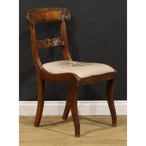 1782 - A suite of seven George IV and later mahogany dining chairs, each with a curved cresting rail carved... 