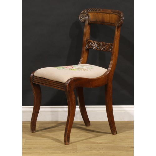 1782 - A suite of seven George IV and later mahogany dining chairs, each with a curved cresting rail carved... 