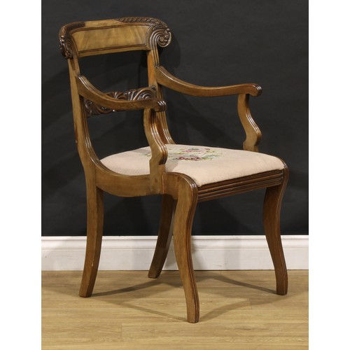 1782 - A suite of seven George IV and later mahogany dining chairs, each with a curved cresting rail carved... 