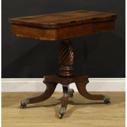 1920 - A Regency rosewood tea table, hinged top above a deep frieze outlined with brass stringing, spirally... 