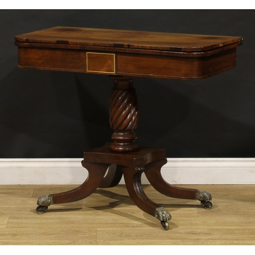 1920 - A Regency rosewood tea table, hinged top above a deep frieze outlined with brass stringing, spirally... 