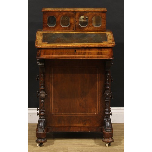 1567 - A Victorian walnut Davenport desk, rectangular superstructure with a pair of mirrored doors enclosin... 