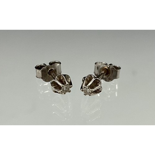 620 - A pair of diamond snowflake cluster earrings each set with thirteen old brilliant cut diamonds, unma... 