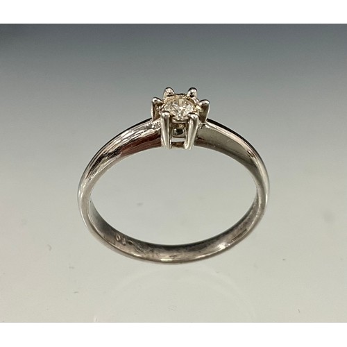 584 - A diamond solitaire ring, round brilliant cut diamond approx 0.10ct, 9ct white gold shank, stamped T... 