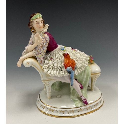 1353 - Continental E.A. Müller Porcelain figure of sitting lady with parakeet, Germany, 20cm high, a early ... 