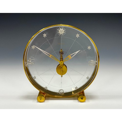 1982 - A Jaeger Le Coultre Tischuhr 'Sternzeichen, perspex and gilt metal deck clock, eight-day visible mov... 